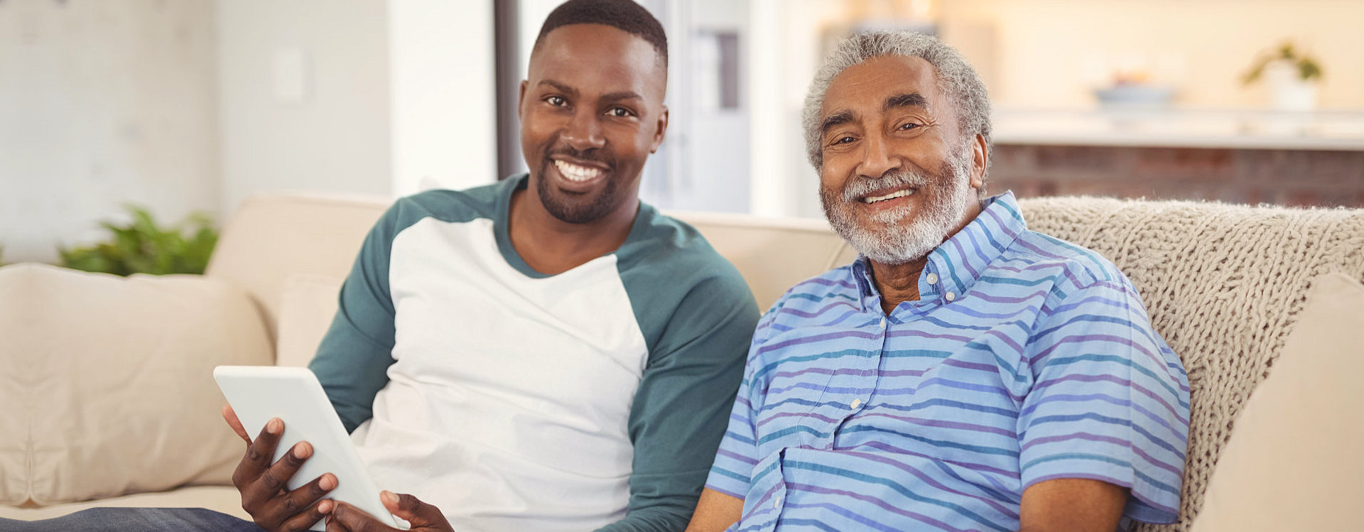 senior and caregiver smiling